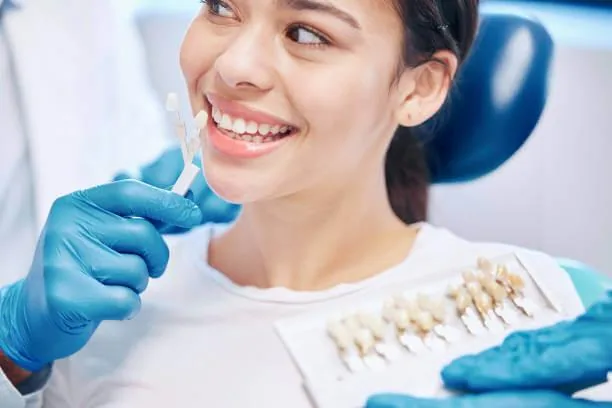 a dentist and patient discussing veneer options during a consultation